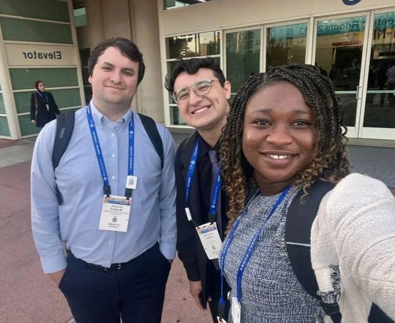 Group members at a conference